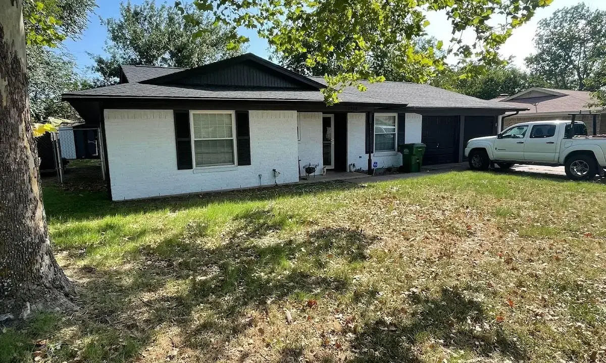 Professional roofing crew working on a residential roof in Red Lion